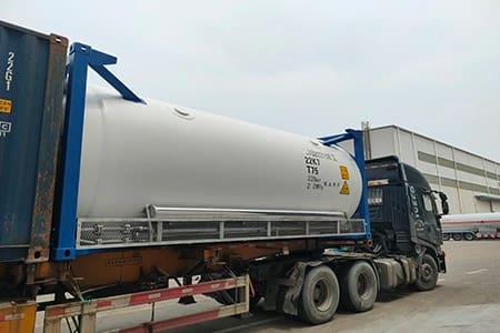 20feet-ISO-tanks-loading-for-export ISO tanks being loaded onto a container lorry for export