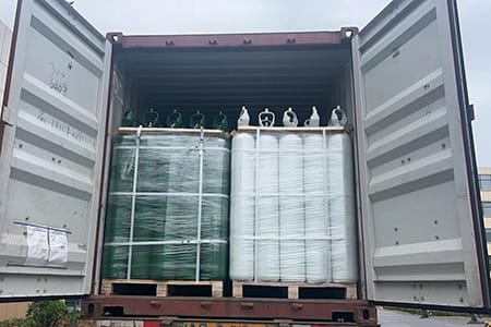 Gas cylinders being prepared for container shipping