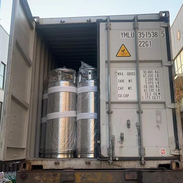 Secure packing of liquid nitrogen cylinders with foam padding and steel frame for safe transportation