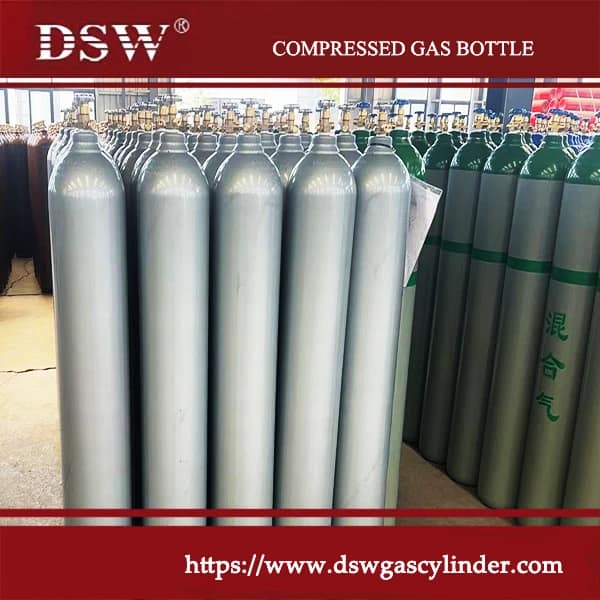 Steel compressed gas cylinder with valve cap used for industrial gas storage