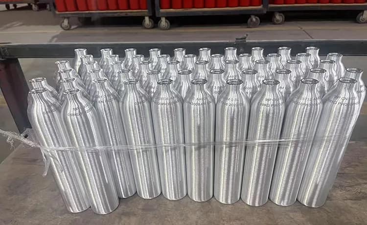 TPED/DOT/GB Aluminum Cylinders 5 High-quality aluminum gas cylinders being precision-manufactured for industrial applications