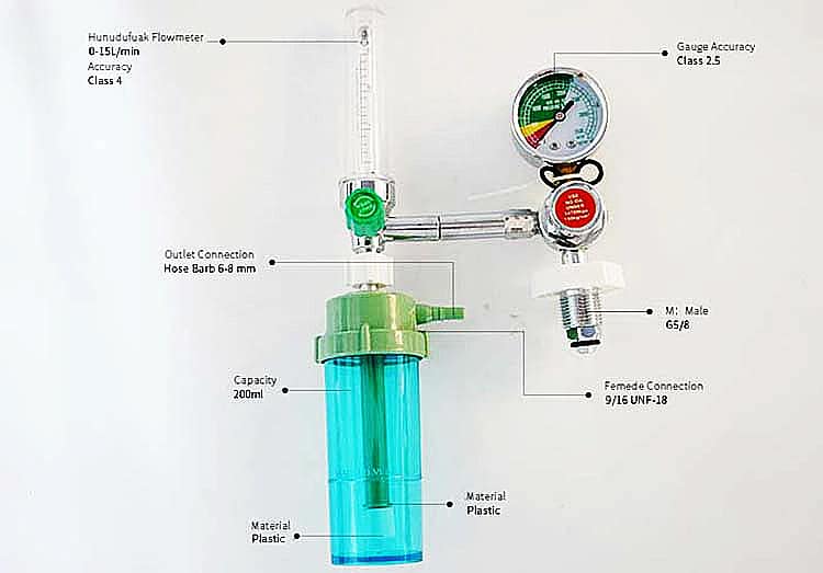 Oxygen Flow Meter with Humidifier 5 Medical oxygen flow meter with humidifier attached to oxygen cylinder regulator in hospital setting