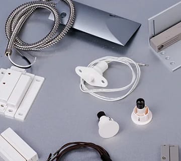 Types of magnetic contacts used in security and alarm systems for doors, windows, and industrial access control